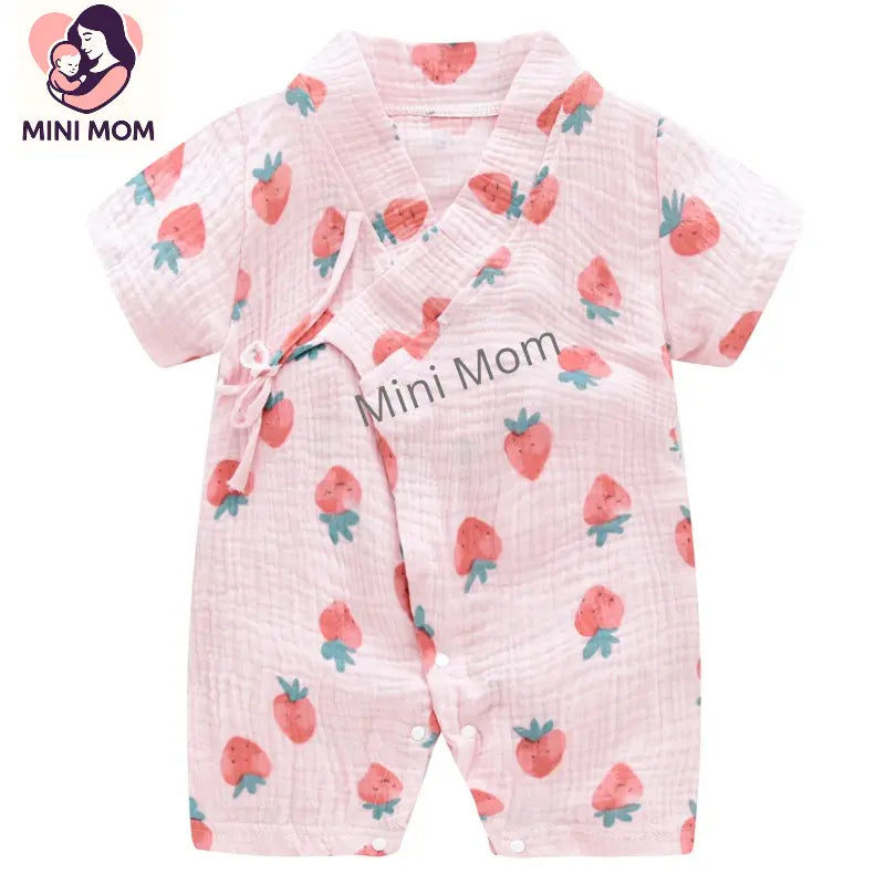 Baby romper with strawberry pattern and 'Mini Mom' text on a white background