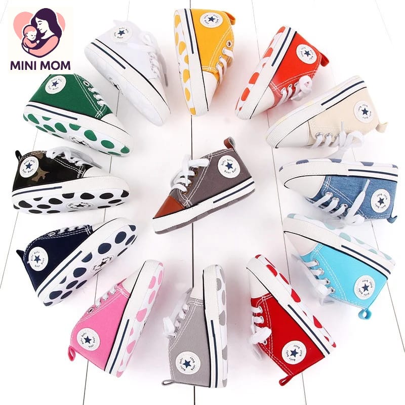 Colorful children's sneakers arranged in a circular pattern on a white background with 'Mini Mom' branding.