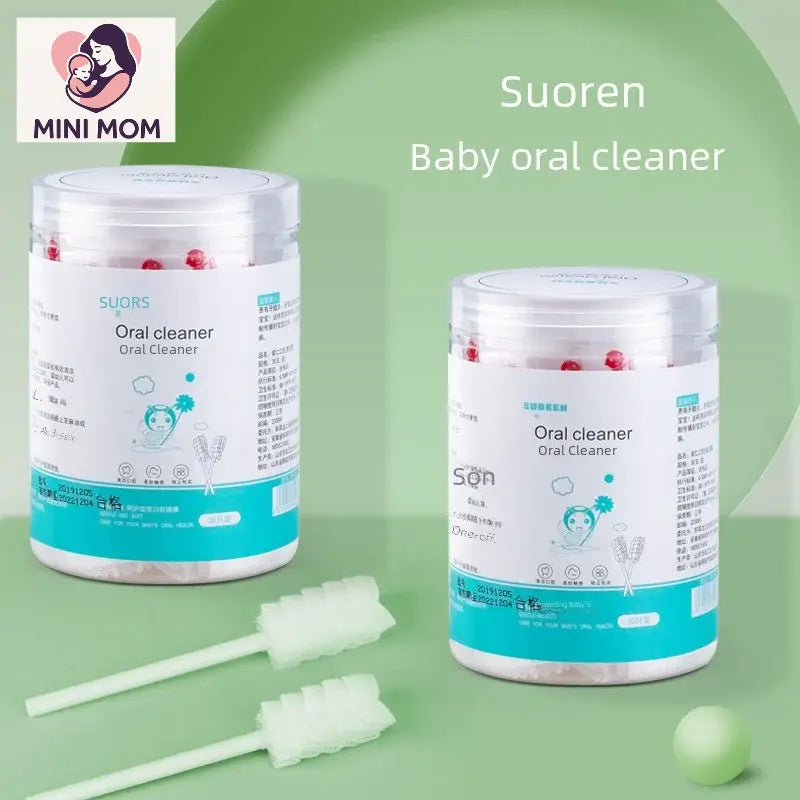 Two containers of Baby oral cleaner with cleaning tools on a green background, featuring the MINI MOM brand.