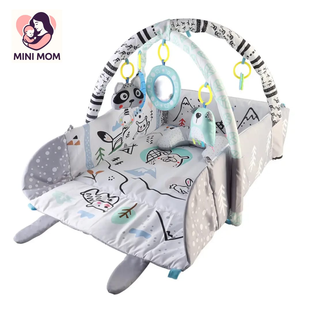 Baby play gym with cartoon animals and 'Mini Mom' branding on a white background