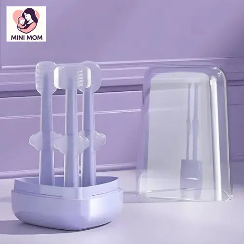 Clear baby silicon toothbrush holder with toothbrushes on a light purple background, featuring the MINI MOM logo