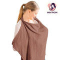 Woman wearing a brown baby breastfeeding nursing cover with 'Mini Mom' logo in the corner