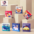 Colorful children's books on geometric blocks with 'MINI MOM' branding.