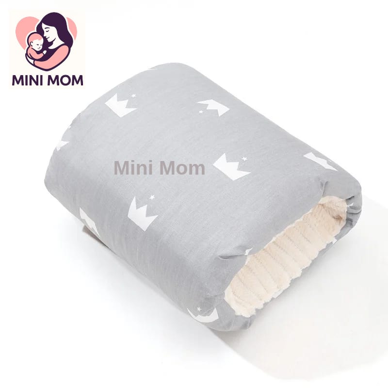 Gray breastfeeding pillow with white patterns and 'Mini Mom' branding on a white background