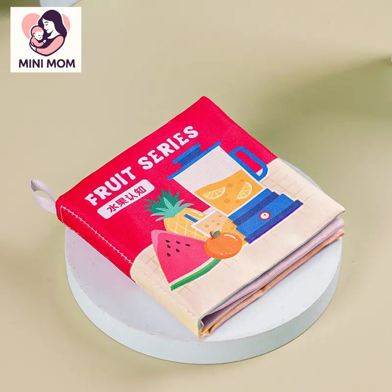 Children's book titled 'Fruit Series' by MINI MOM on a white platform with a light green background.