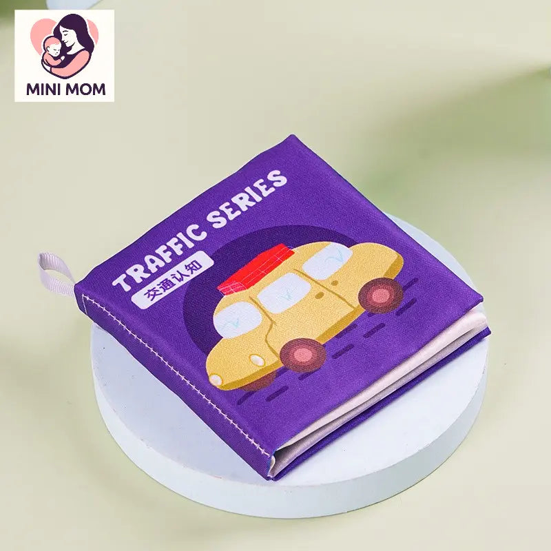Purple baby book titled 'Traffic Series' with a yellow car illustration on a light green background, featuring the brand 'MINI MOM'.